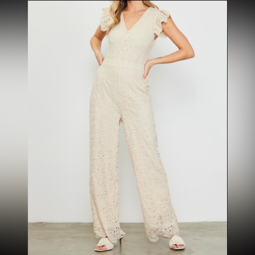 New with tags. Cream crochet jumpsuit. Multiple sizes